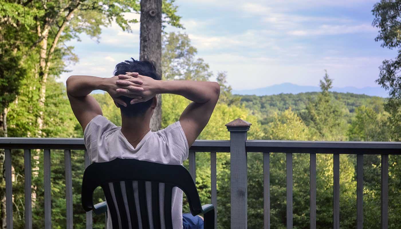 One of our very first Rhinebeck residents, Brian Oh, takes in the views from the back deck of The Crystal Cottage in July 2016.