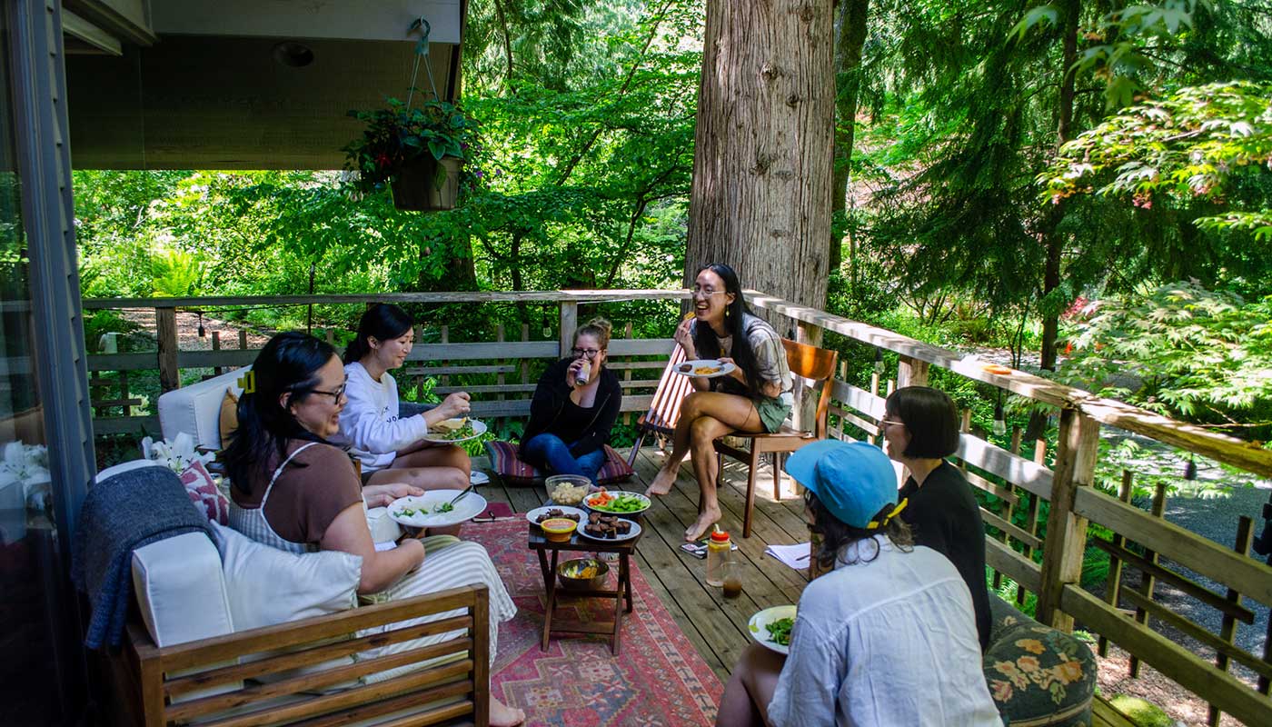 Our 2023 spring Bainbridge residents gather outdoors for a creative resource share session.