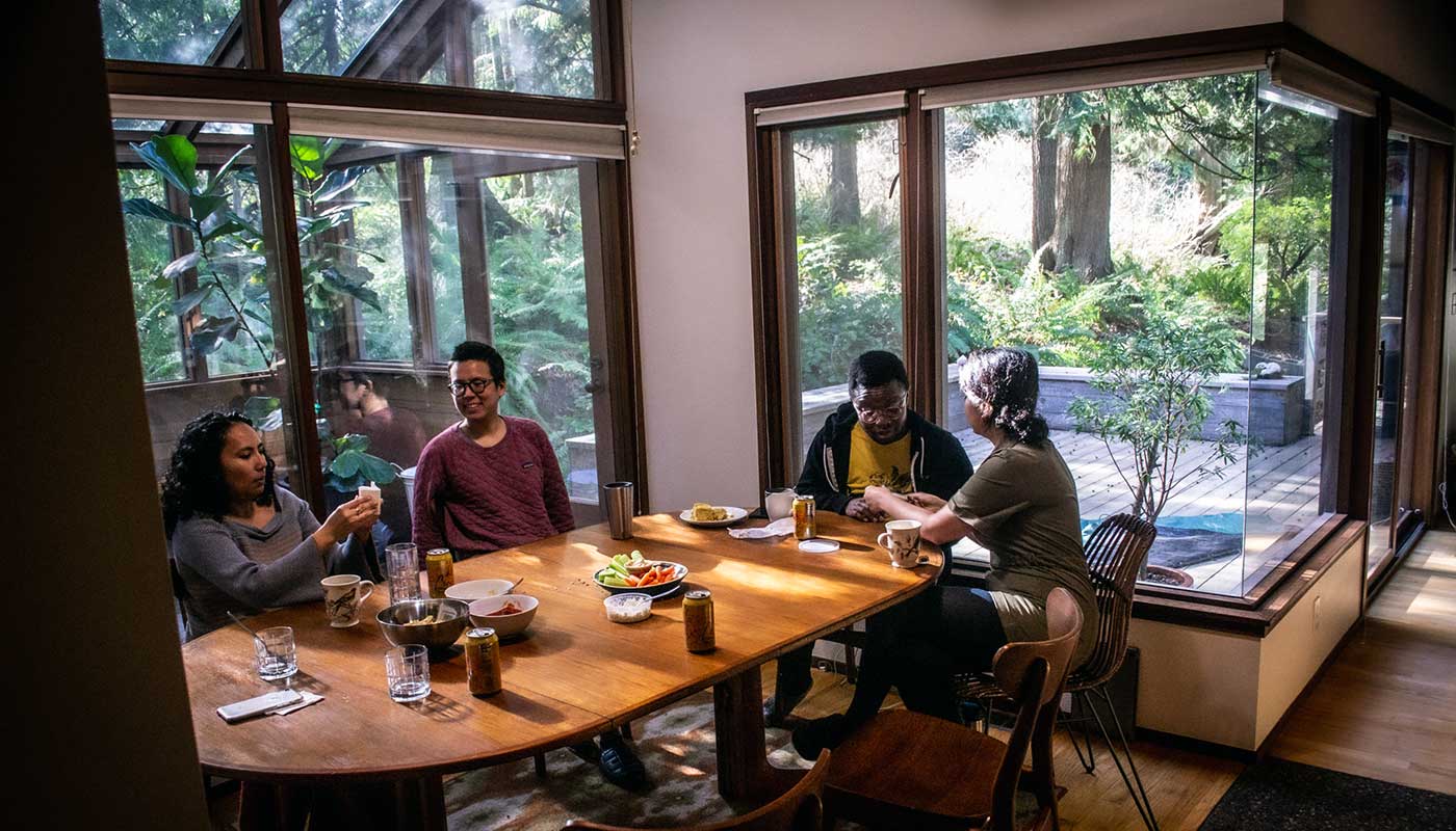All of our in-person residencies revolve around food because we believe nourishment is key to creativity. Here, our 2020 Bainbridge residents share space after a meal.
